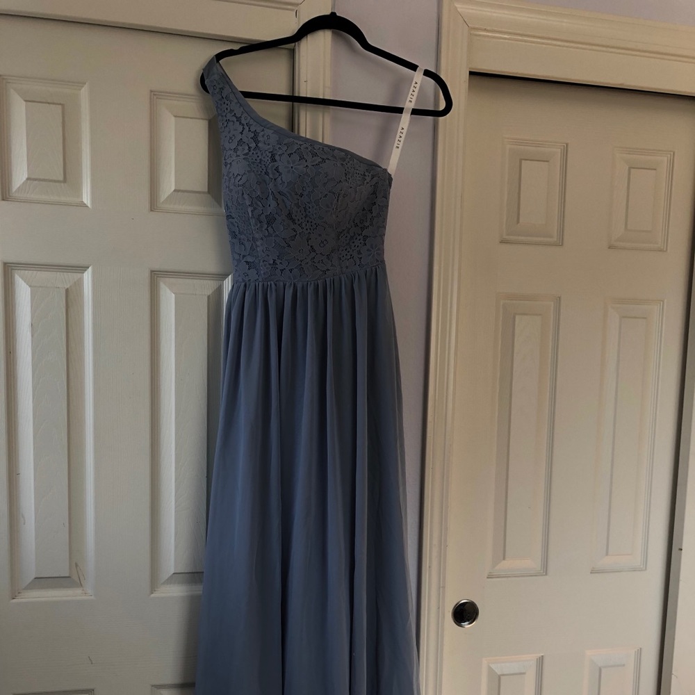 This dress was purchased for a wedding as a bridesmaid dress.